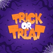 Trick or Treat writing with spider webs and twisted branches