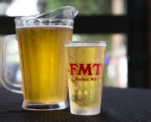 Pitcher of beer and a glass of beer | Fat Mama's Tamales Restaurant Natchez MS
