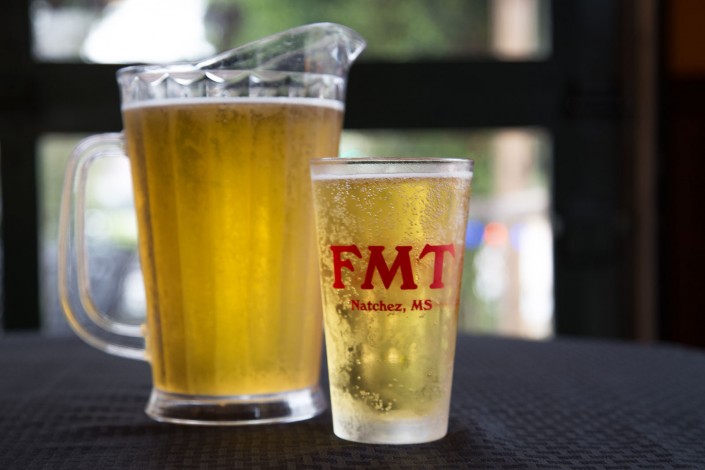 Pitcher of beer and a glass of beer | Fat Mama's Tamales Restaurant Natchez MS